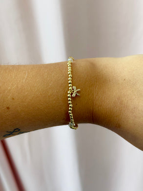 Kiddie Bar 18K gold stretch charm bracelet